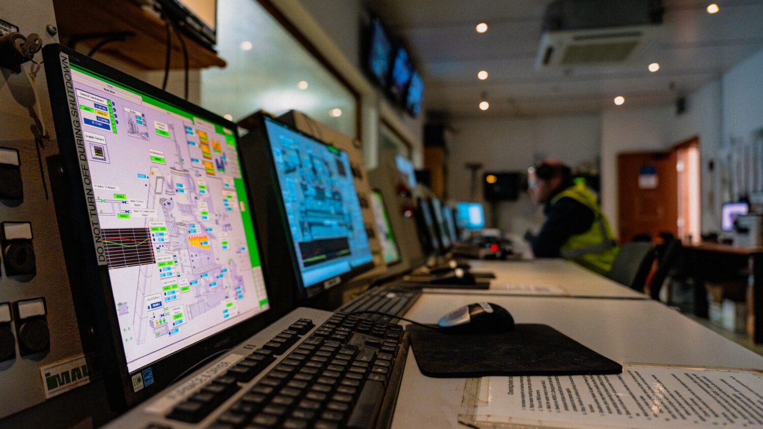 The Eirebloc control room desk, with process screens showing the production line.
