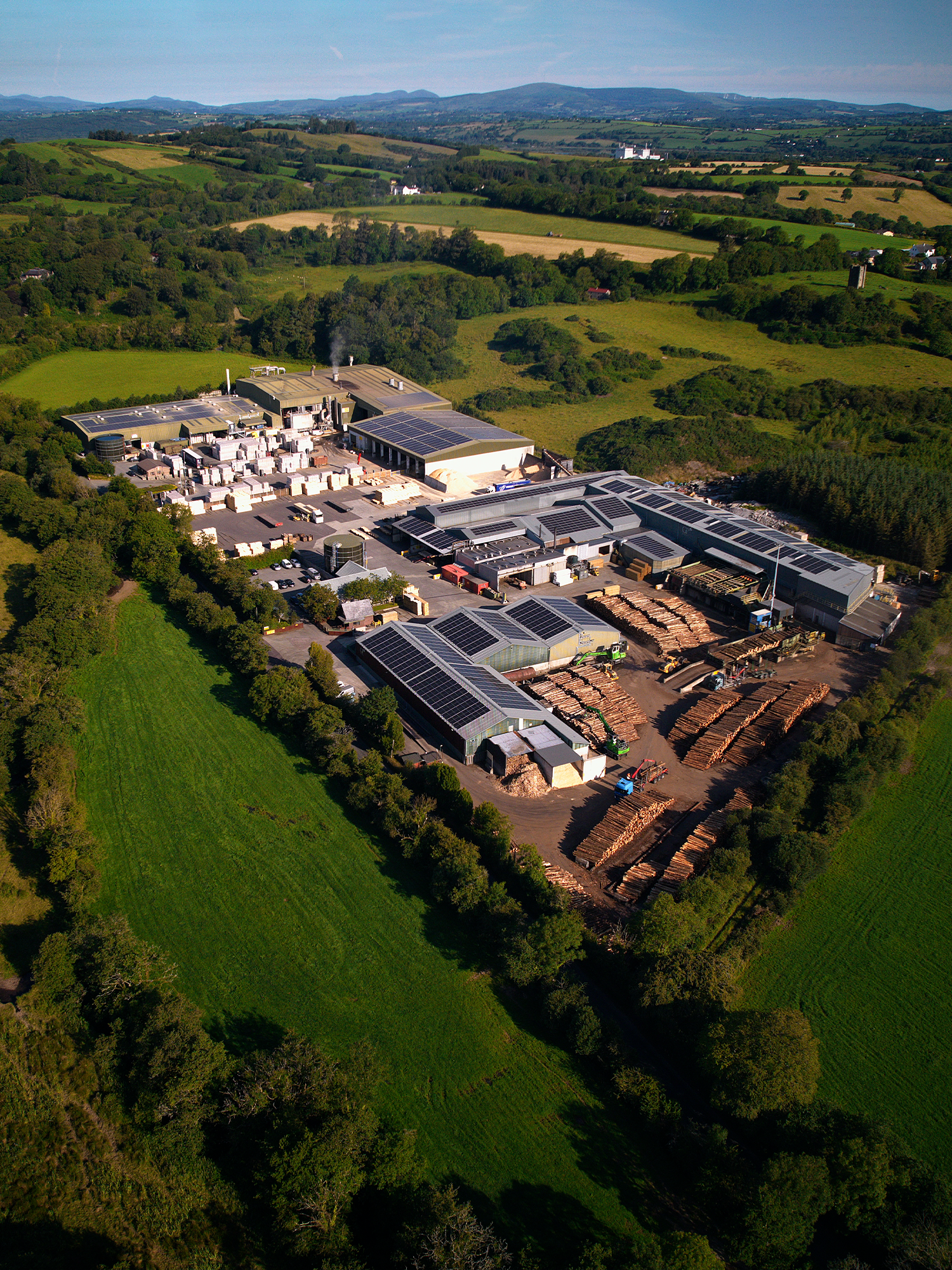 Aerial view of the Eirebloc and GP Wood site set in green County Cork farmland.
